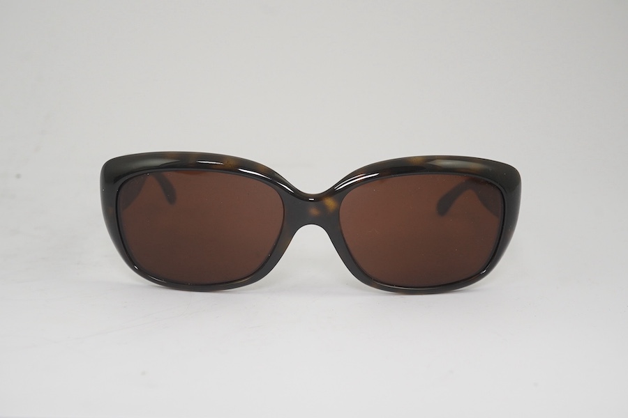 Two Gucci cased sunglasses, Rayban and another